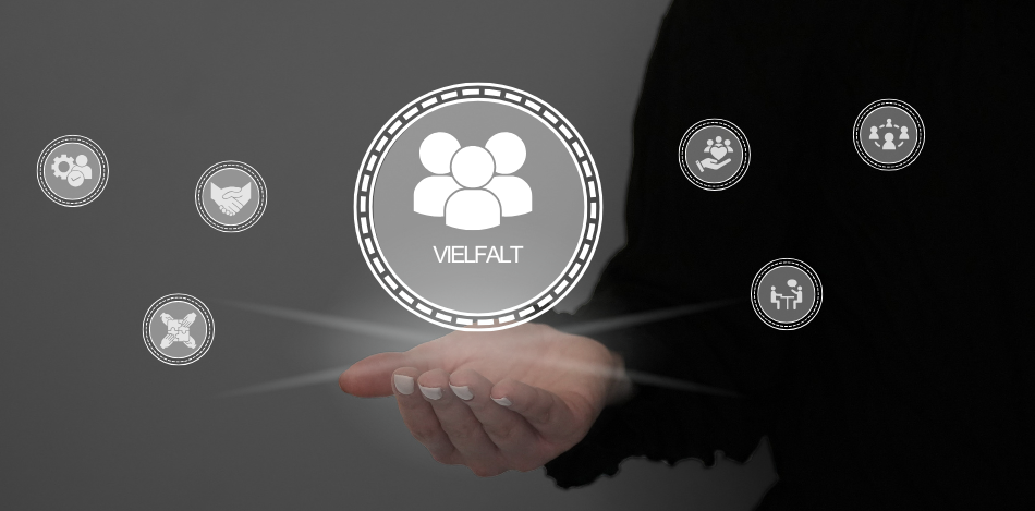 Vielfalt Man sieht einen Kreis mit dem Wort Vielfalt neben kleineren Kreisen mit verschiedenen Symbolen.